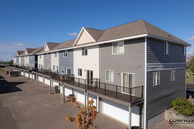 Building Photo - SPACIOUS TOWNHOME CONVENIENTLY LOCATED WITH IN-UNIT LAUNDRY