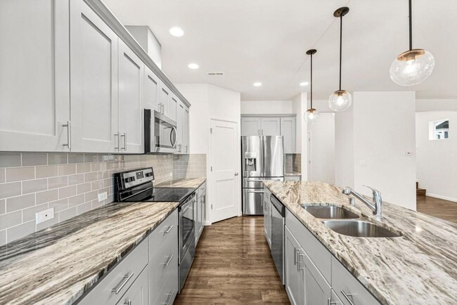 Building Photo - Spacious 4-Bedroom Home with Quartz Counters, Fully Fenced Yard & 2-Car Garage in Yelm!