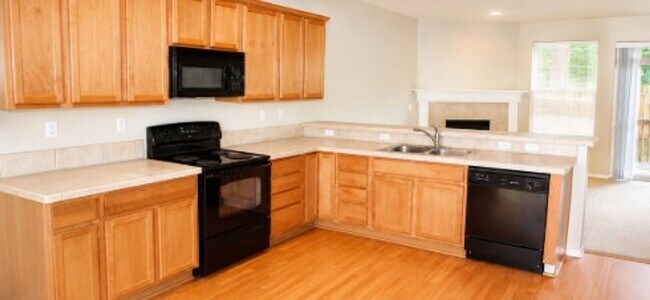 Building Photo - 15561 SW Stone Ridge Cir