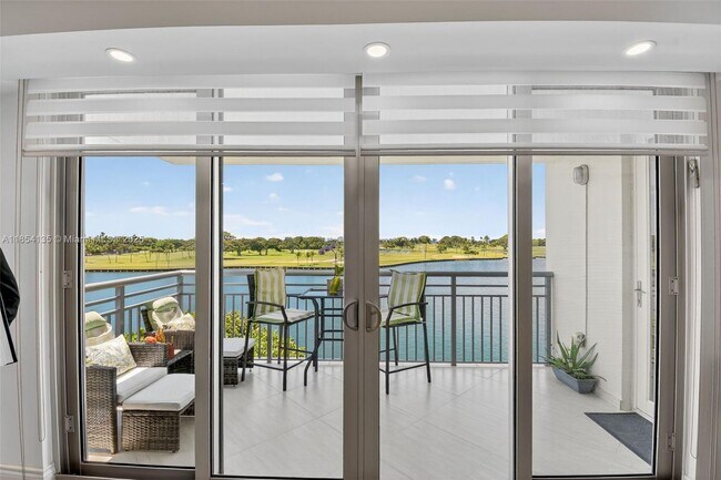 Building Photo - 9250 W Bay Harbor Dr