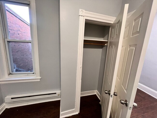 Building Photo - Updated 3 Bedroom 1.5 Bath Townhome w/ Paved Yard + Washer & Dryer