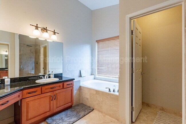 Building Photo - 9910 E Sutton Dr