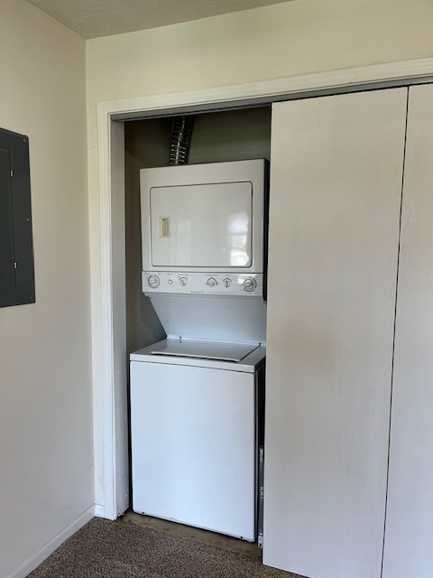 Mechanical closet with stacked unit washer and dryer - 120 Twyckenham Blvd