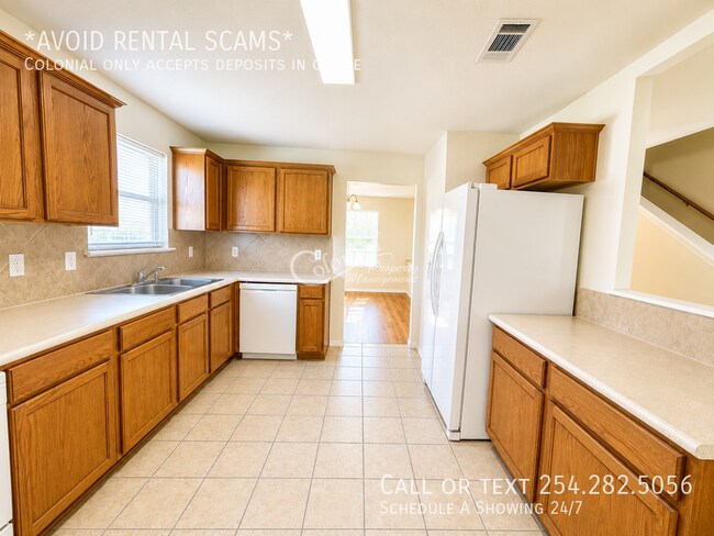 Building Photo - 5406 Boot Scootin Ct