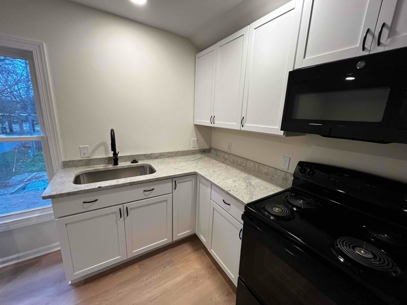 Building Photo - 529 E Grand River Ave