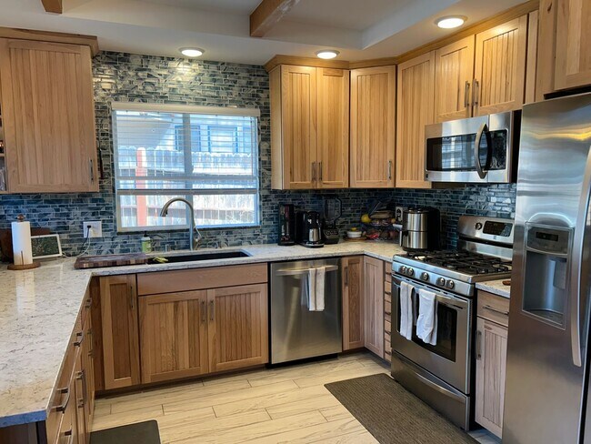 Building Photo - Upscale Chalet with 2 Car Garage Backing t...