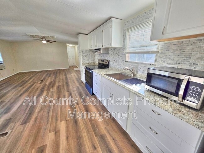 Building Photo - 7603 Plumwood Dr