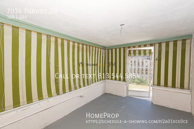 Building Photo - 7034 Parrot Dr