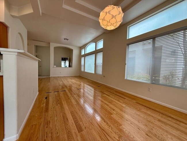 Building Photo - Spacious 3 Bedroom 2.5 Bath Townhouse with Private Garden Patio & a Community Pool/Spa! Attached ...