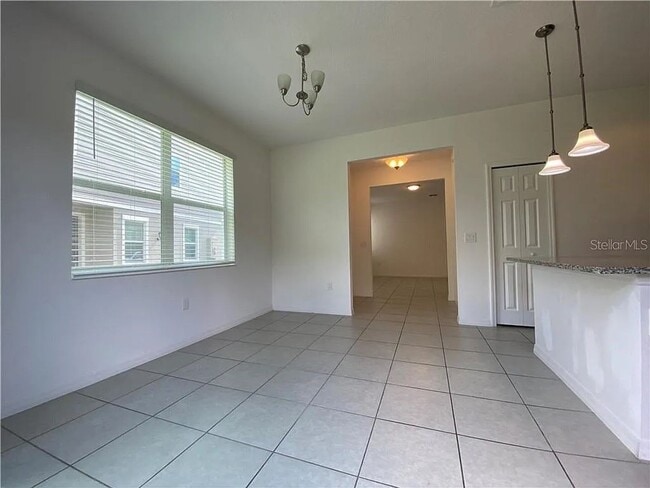 Building Photo - Beautiful End Unit Townhome Near Lake Nona w/ 2-Car Garage & Conservation Views!