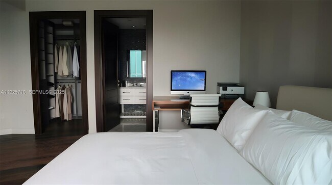 Building Photo - 10295 Collins Ave