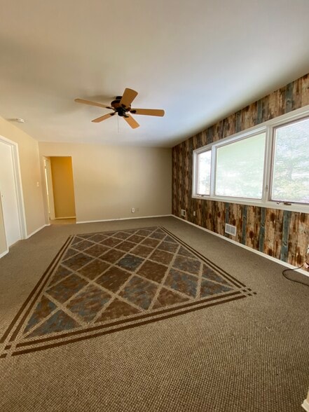 Carpet will be replaced with hardwood floor and wall paper will be removed. - 57 Morgan Ln