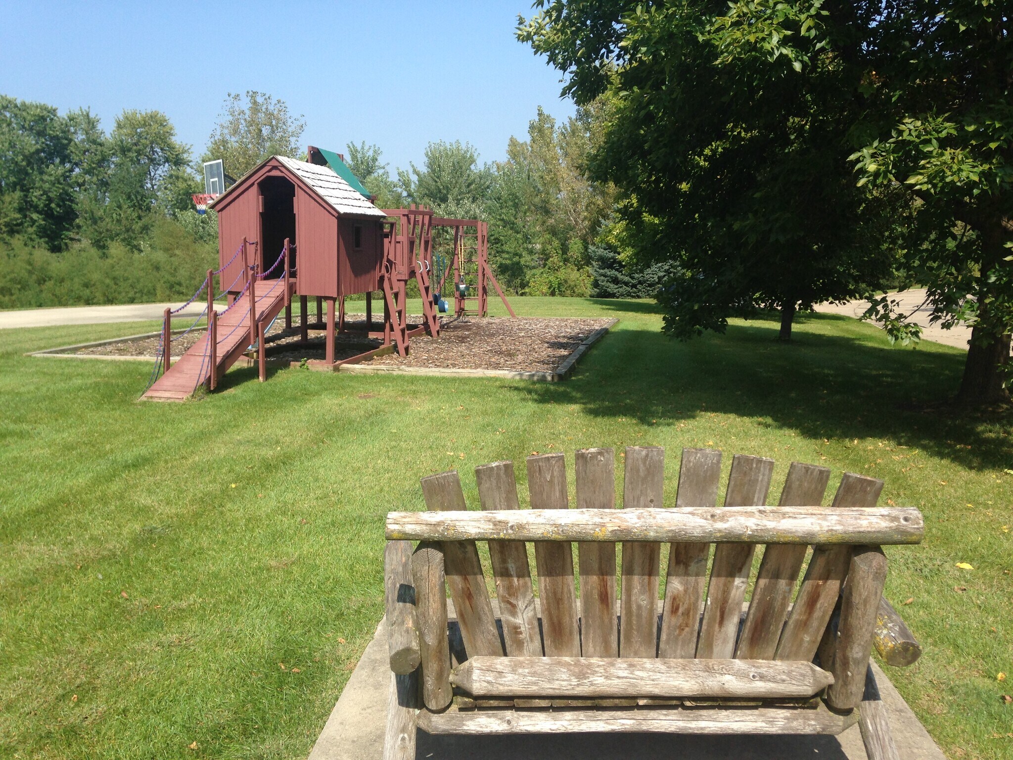 Shared playground and basketball hoop - 2738 Irving Avenue
