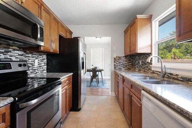 Building Photo - 2456 SE Melaleuca Blvd