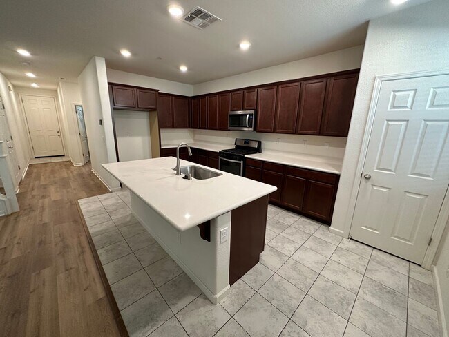 Building Photo - Stunning 4 Bedroom, 3 Bath Gated Community W/ Solar