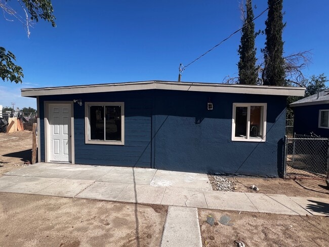 Building Photo - 9529 E Ave T 12