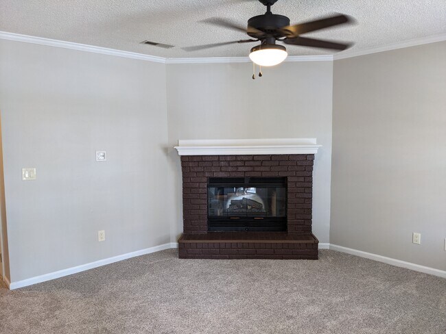Living Room with electric fireplace & fan - 940 Glenn St