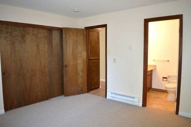 Building Photo - Spacious and Conveniently Located with Private Patio and Parking