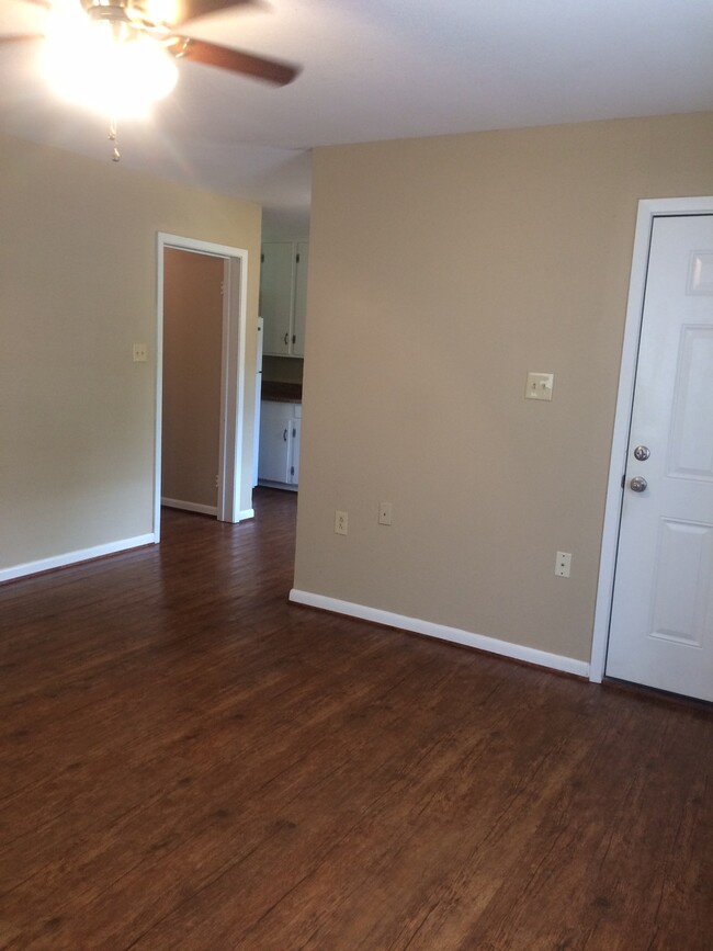 Living room opens to kitchen - 213 Mitchell St