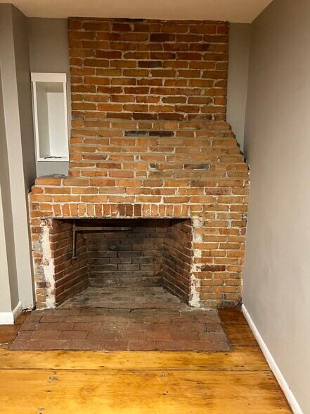 Original fireplace in bedroom - 347 Elliot St