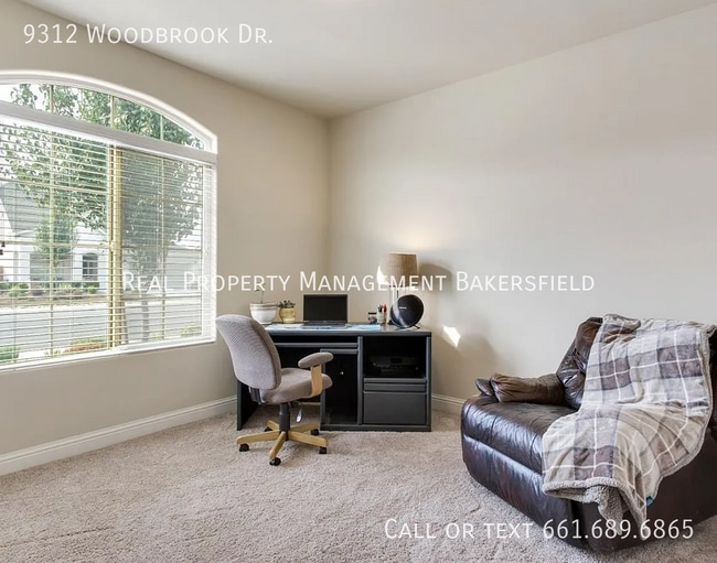 Building Photo - 9312 Woodbrook Dr