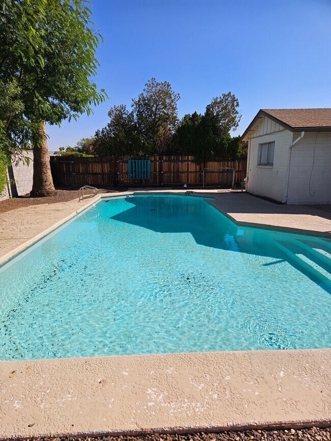 Building Photo - Updated 4BR Home | Pool + 2 Car Garage | Single Level