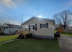 Building Photo - Reduced Deposit $595.00 Freshly painted 3 bedroom with new flooring throughout!