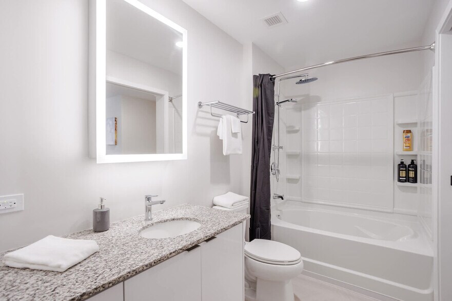 Building Photo - 9-JAN-JAN E 4th St