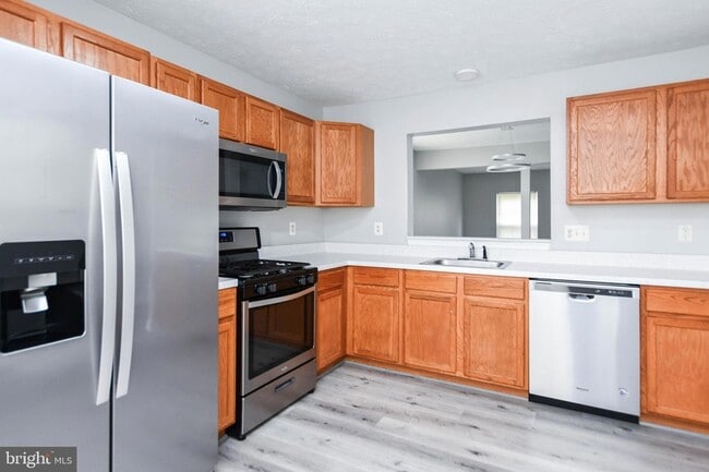 Building Photo - 9815 Berrywood Ct