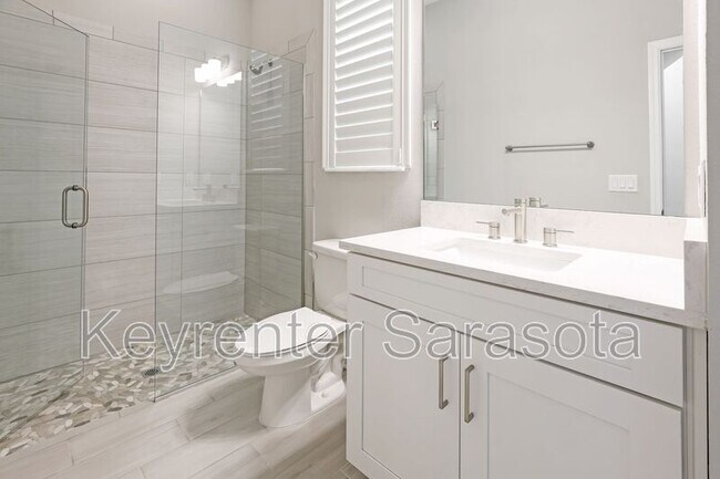 Building Photo - 6133 Lungo Lago Dr