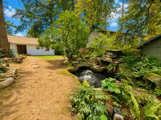 Building Photo - Sunlit Park-Like 1937 Olympic Hills in Lush Garden Oasis