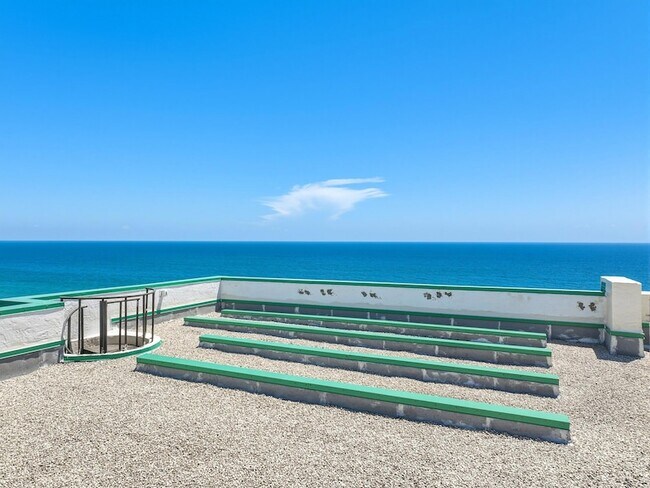 Building Photo - 9900 S Ocean Dr