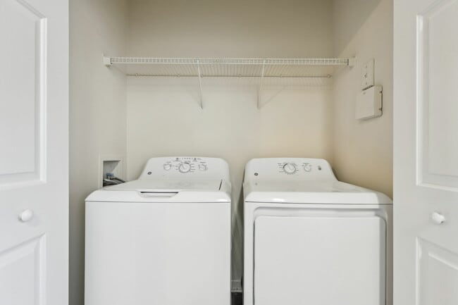 Effortless laundry days with this well-equipped space. - Redwine Creek