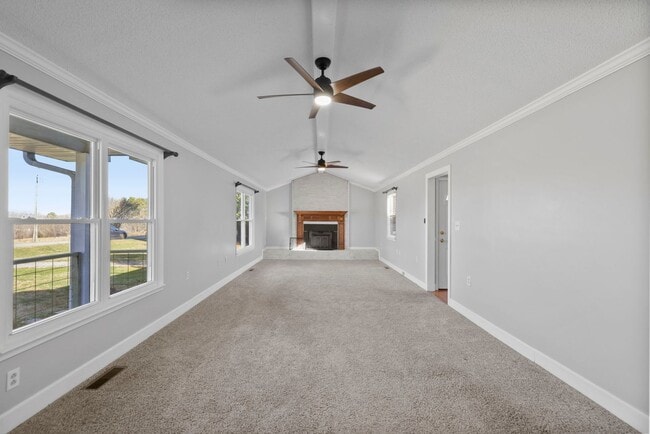 Building Photo - Welcome to this Comfortable, Charming & Outdoor Living, Single-Level Home