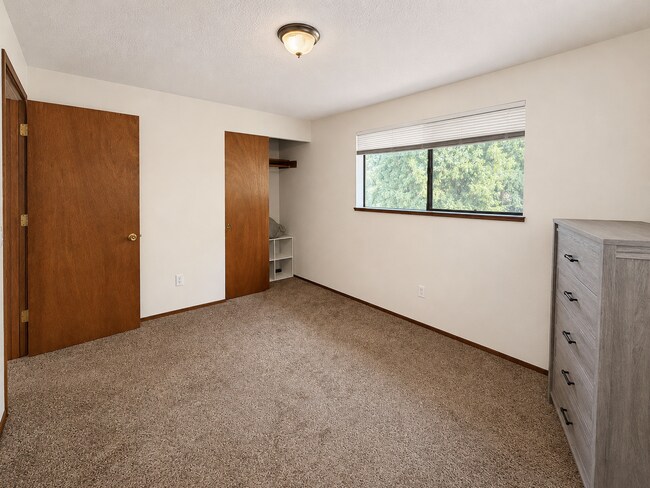 Building Photo - Beautiful Split-Level Home with Fireplace, Deck, Garage, and EV Charger