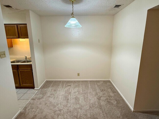 Building Photo - Move-In Special.  ½ off the first full month's rent with a 12 month lease