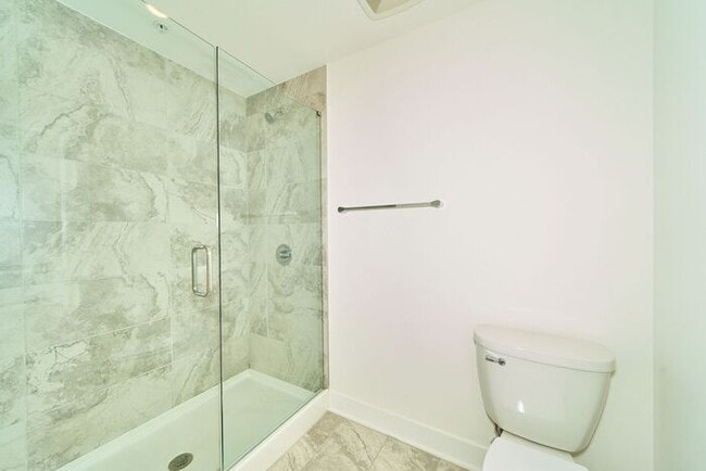 Building Photo - Sweet 2 Bed 2 Full Bath Downtown Indy Condo with Balcony Views!