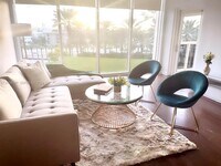 Building Photo - 10275 Collins Ave
