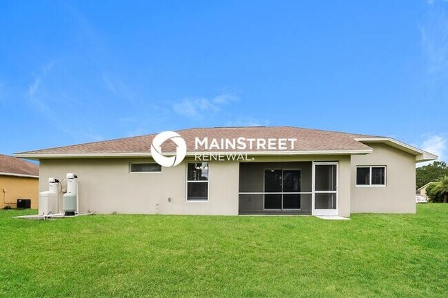 Building Photo - 3 Bedroom Pet-Friendly Home in Lehigh acres, FL with Main Street Renewal