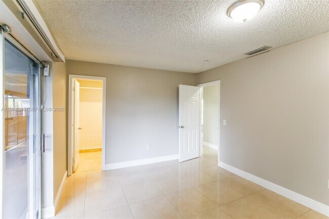 Building Photo - 8410 NW 27th Pl