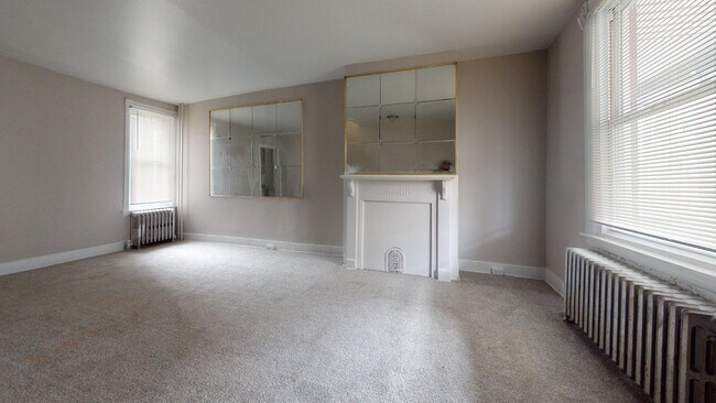 Building Photo - Three Bedroom Home Near Carroll Park