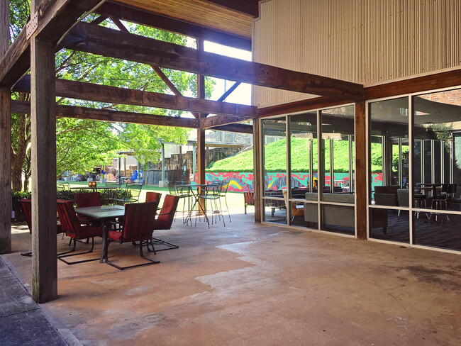 Another view of the covered seating and community greenspace. - 659 Auburn Ave NE #145