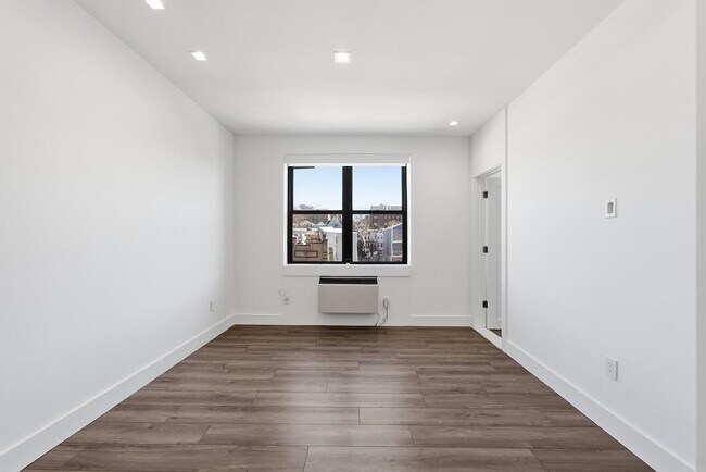 Building Photo - 43-49-49 Van Wagenen Ave
