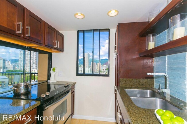 Building Photo - 2 br, 1 bath House - 2121 Ala Wai Blvd. #1503