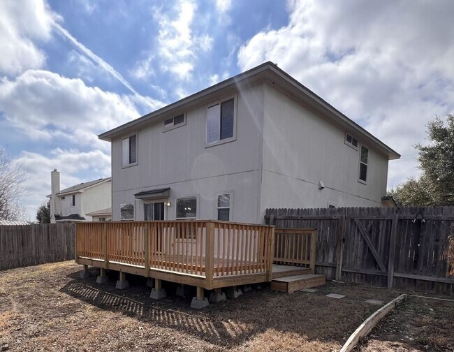 Building Photo - Generous Outdoor Space & Lawn Care Included!