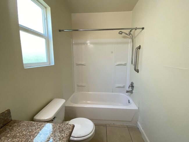 Building Photo - Spacious Duplex with Two Bedrooms, Two Bathrooms and Two Car Garage