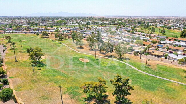 Building Photo - 9807 W Mockingbird Dr