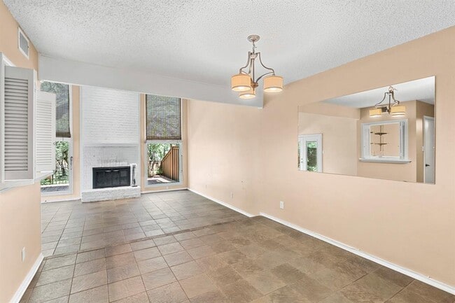 Building Photo - 8301 Greenslope Dr