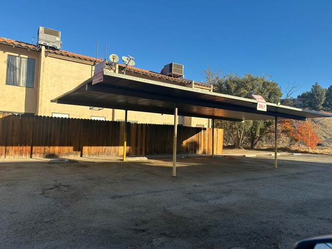 Building Photo - 2+1.5 READY NOW! Assigned parking. ON-SITE...