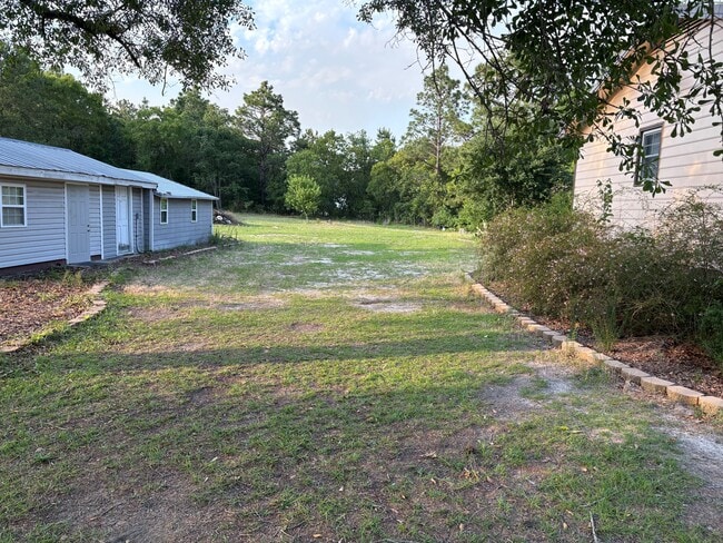 Building Photo - 6987 Pittman Grove Church Rd